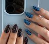 Polka dots nails: nas décadas de 50 e 60, nossas avós usavam essa estampa em roupas; agora, ela virou sinônimo de manicure elegante