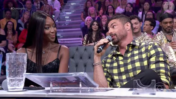 No 'Domingão', Naomi Campbell reviveu uma história inusitada com Cauã Reymond