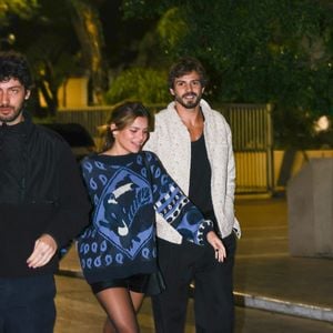 Luana Maia espantou frio de moletom de tricô, meia-calça e bota