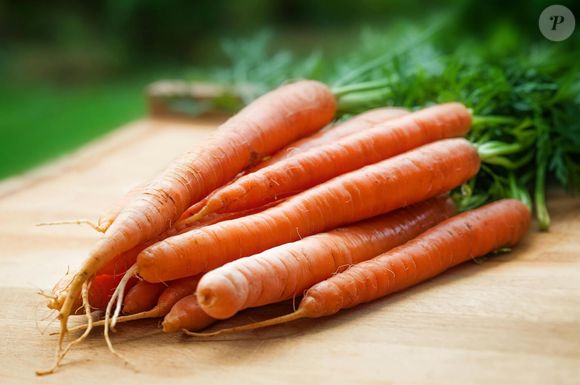 As cenouras contribuem para regular a pressão arterial e equilibrar os níveis do colesterol LDL, além de prevenir a prisão de ventre