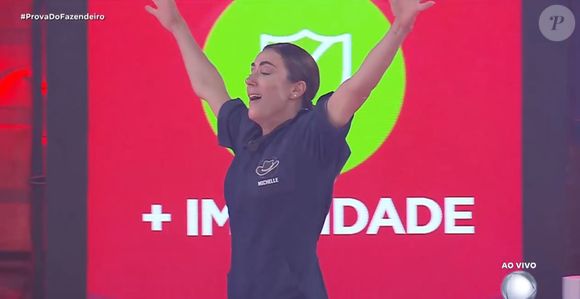 Michelle Barros escapou do risco de eliminação ao vencer a Prova do Fazendeiro em disputa contra Saory Cardoso e Tamires