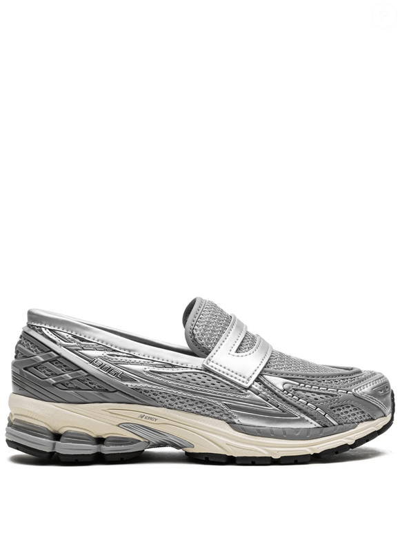 Nem só de sandálias vive o verão: o New Balance 1906L surge como alternativa elegante para mulheres clássicas que querem conforto sem abrir mão do estilo