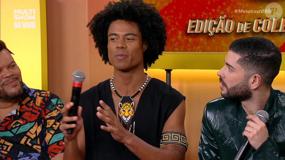 Breno escolhe macacão preto sem mangas com acessórios de referências indígenas, reforçando estilo com identidade cultural