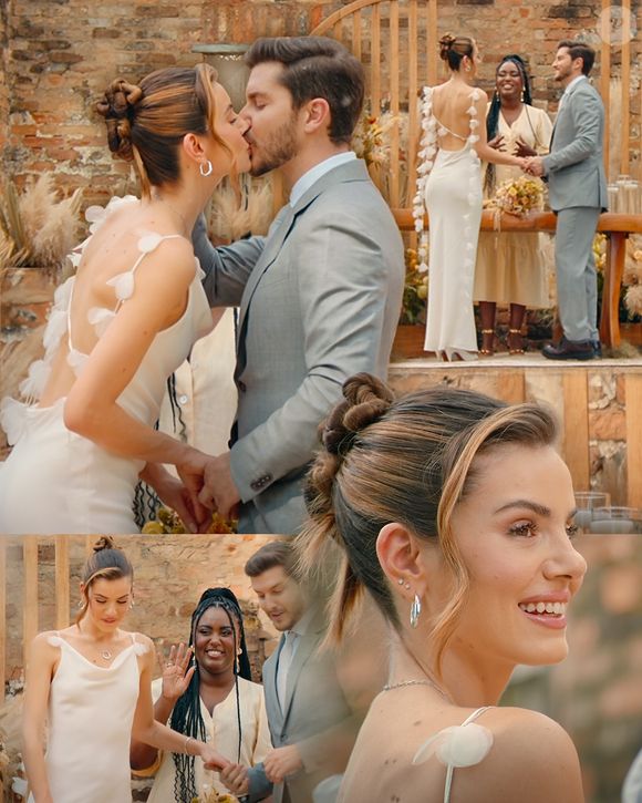 Assim como os participantes, Camila Queiroz também apareceu vestida de noiva com um vestido romântico e discreto