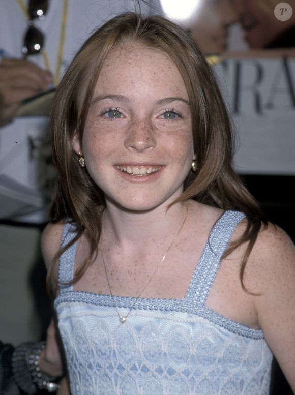 1998: Lindsay Lohan, ainda criança, participando da première do filme 'Operação Cupido'