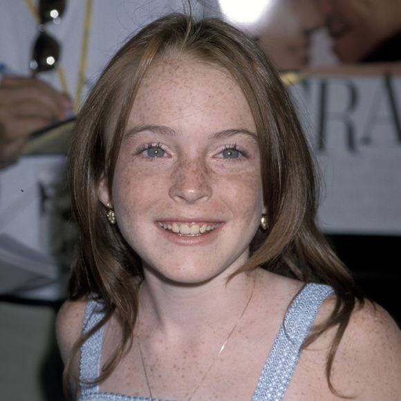 1998: Lindsay Lohan, ainda criança, participando da première do filme 'Operação Cupido'