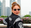 Camisa de tricô do 'Brasil', jaqueta college da Adidas e óculos da Prada de mais de R$ 3,5 mil: um raio-X de Paolla Oliveira em looks estilosos de viagem na China