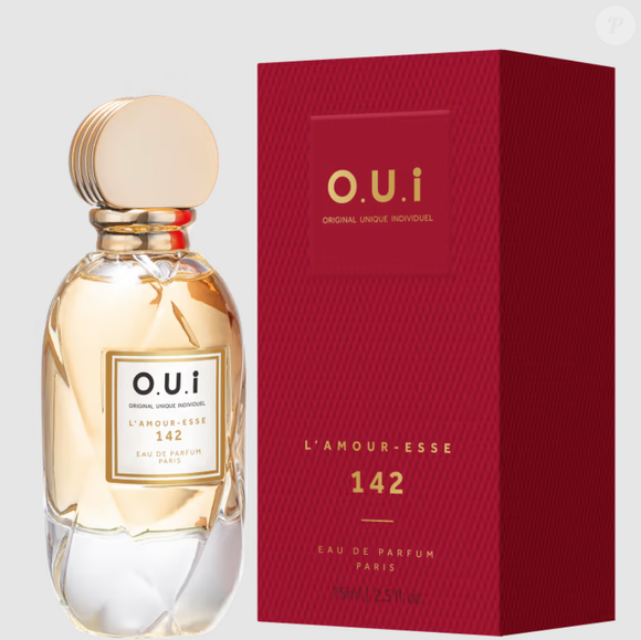 Perfume O.U.i. L’Amour-Esse 142é um floral branco envolvente com flor de laranjeira, ylang-ylang e o fundo suavizado com musk.
