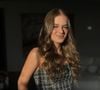 "Minha menina virou mulher. Mini me", escreveu Tici na legenda da foto, que destacou Rafa em um look quadriculado