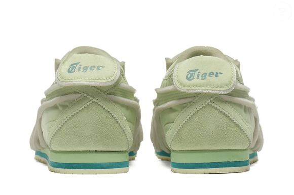 O Onitsuka Tiger Mexico 66 SD Exposed Foam Jade Verde também pode ser combinado com peças de alfaiataria, como calças de corte amplo e blazers em tons neutros. Bege, branco, cinza e marrom são algumas das cores que podem harmonizar com o verde suave do calçado
