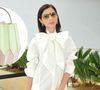 Giselle Batista combina look com bolsa inspirada em dobraduras do origami na SPFW; acessório de marca brasileira custa R$ 3,8 mil