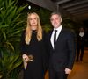 Angélica e Luciano Huck prestigiaram casamento; apresentadora elegeu um look sóbrio e sexy, com um recorte que deixou a perna à mostra