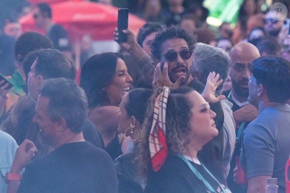 Ivete Sangalo e o namorado Tiago Maia foram flagrados em um show do cantor Belo neste sábado, dia 11 de julho de 2026