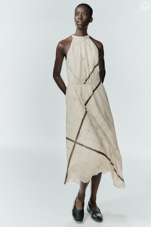 Outro vestido estampado que se destaca pela elegância é este com inspiração nos anos 40