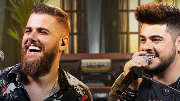 Zé Neto e Cristiano são proibidos pela Justiça de divulgarem vídeo de música que envolve conversas íntimas de Daniel Vorcaro; influencer pede indenização à dupla: 'Contexto vexatório'