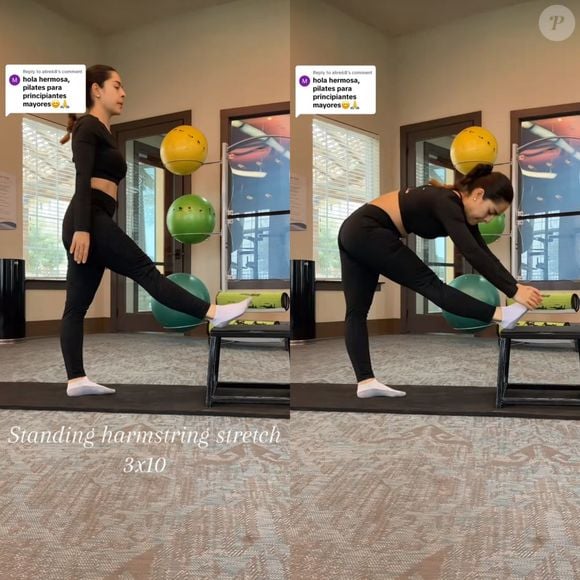 Exercício de pilates com alongamento dos músculos isquiotibiais em pé trabalha os músculos posteriores da coxa, ligados diretamente à região da coluna lombar.