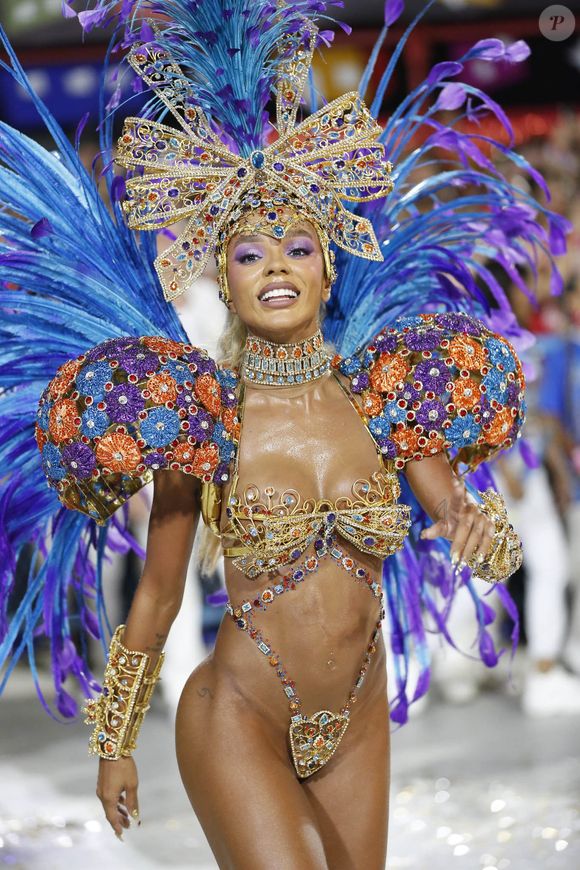 Esposa de Ludmilla tem portas abertas na Beija-Flor, mas não para desfilar, afirma presidente da agremiação: 'Ela é um amorzinho, a gente gosta muito dela. As portas estão abertas para quando quiser vir, mas para desfilar, não!'