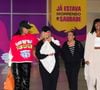 Brunna Gonçalves e a mulher, Ludmilla, combinaram roupa de frio no desembarque no Rio de Janeiro