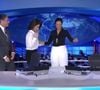 Renata Vasconcellos recebe o bastão de Patrícia Poeta no Jornal Nacional em 31 de outubro de 2014, um momento que marcou a história da Globo