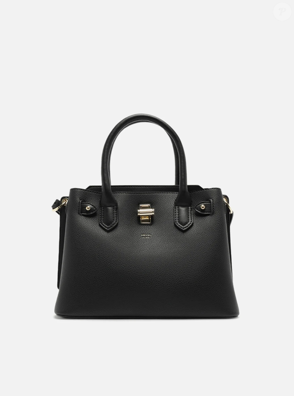 Bolsa preta de couro da Arezzo: a escolha ideal é uma bolsa estruturada de tamanho médio, com aquela pegada executiva, perfeita para carregar na mão ou sob o braço, bem no estilo fashionista clássica