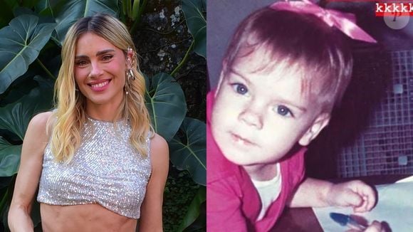 Sempre com a caneta na mão, Carolina Dieckmmann já tinha um olhar de personalidade quando criança