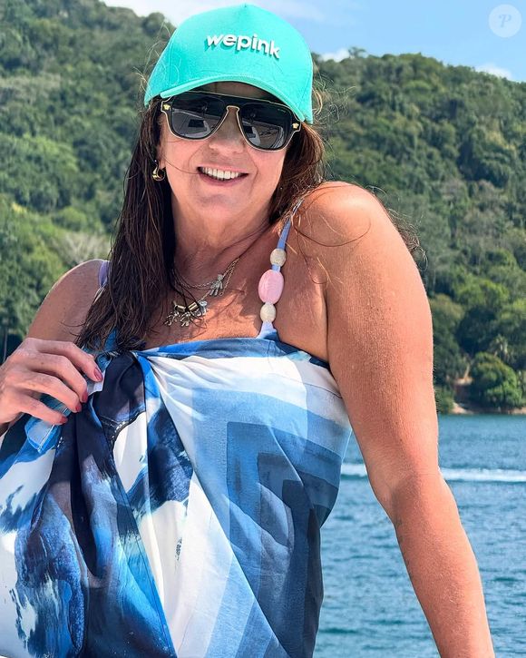 Margareth Serrão também estava usando um boné verde água da WePink.