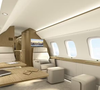 Interior do Bombardier Global 7500 revela sala de estar com sofás, TV e sistema de entretenimento a bordo