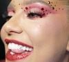 A Virginia Fonseca já havia usado um tooth gem durante o Carnaval, quando exibiu o número '7' no dente em homenagem a Vini Jr., antes de substituir o desenho pela letra 'V' feita com diamantes