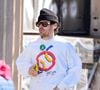 O estilo inconfundível de Harry Styles vai além da moda: as fragrâncias associadas ao cantor ajudam a compor sua imagem elegante e cheia de personalidade