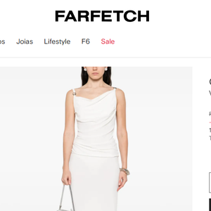 Vestido de Carolina Dieckmmann está em promoção de 10% OFF no site FARFETCH e pode ser comprado por R$ 5.064