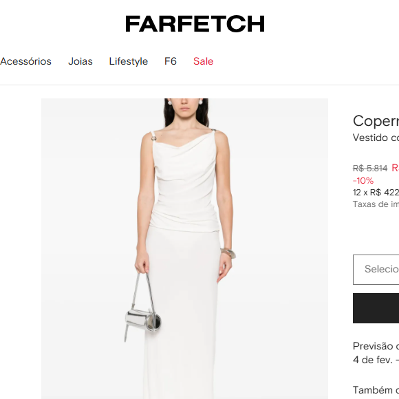 Vestido de Carolina Dieckmmann está em promoção de 10% OFF no site FARFETCH e pode ser comprado por R$ 5.064