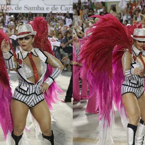 Viviane Araújo usou uma fantasia de malandro com 8 mil pedras e um body representando um terno. Nas costas, uma 'asa' em degradê de rosa e vermelho