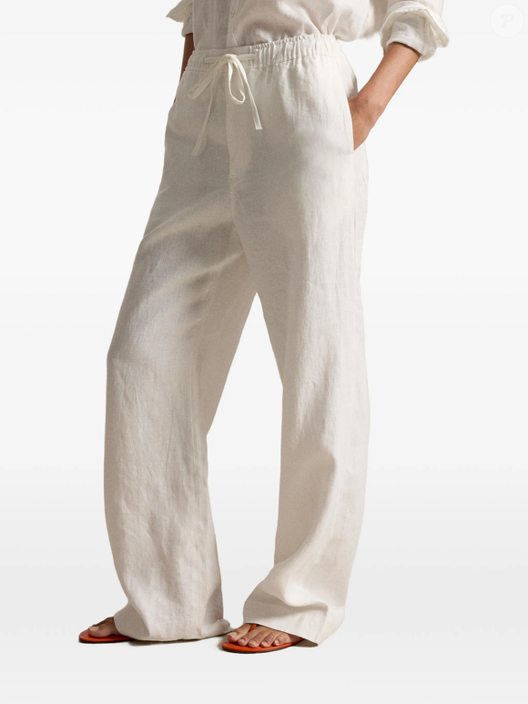 Modelagem ampla, tecido premium e parcelamento em até 12x de R$ 214,75 na Farfetch: a calça de linho da Polo Ralph Lauren entrou para a lista de desejos do inverno