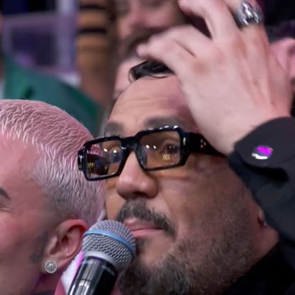 Belo bem que tentou desconversar, mas não conseguiu evitar o climão na TV