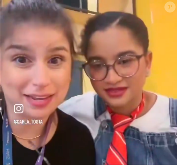 Milena apareceu ao lado de uma seguidora e confessou um desejo antigo de ver o rosto de Theo, filho de Sandy