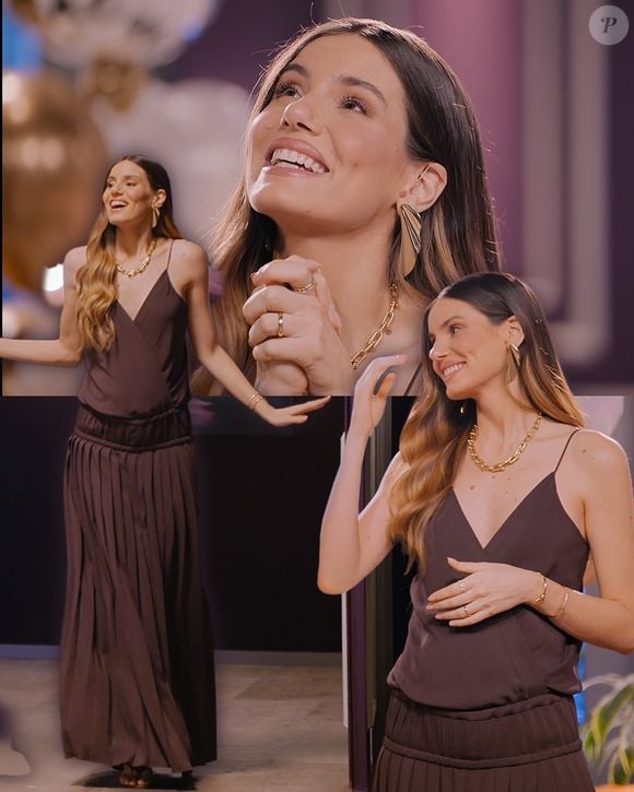 Já gravida, Camila Queiroz apareceu em 'Casamento às Cegas 50 +' com um vestido marrom fluido e plissado para receber mensagem carinhosa de ex-participantes