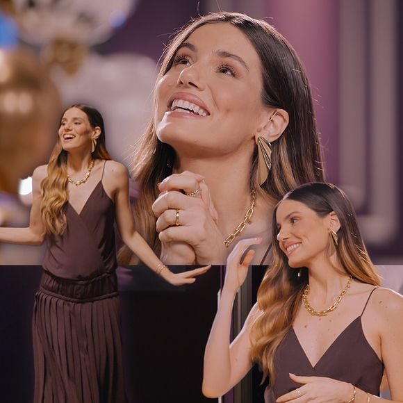 Já gravida, Camila Queiroz apareceu em 'Casamento às Cegas 50 +' com um vestido marrom fluido e plissado para receber mensagem carinhosa de ex-participantes