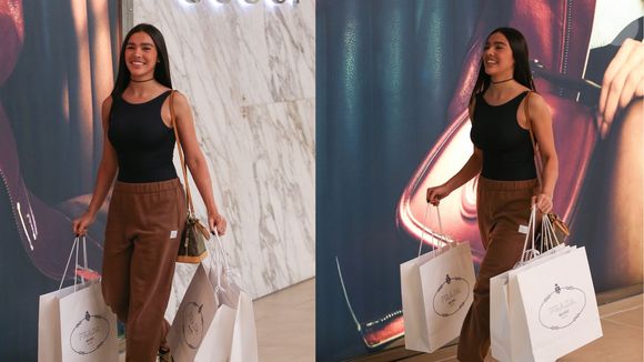 Duda Guerra, namorada de Benício Huck, foi flagrada com sacolas de grife em shopping de luxo na Barra da Tijuca nesta sexta-feira (1º)
