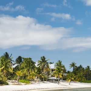 View of the beach and the stunning waters of Little Cayman in Cayman Islands