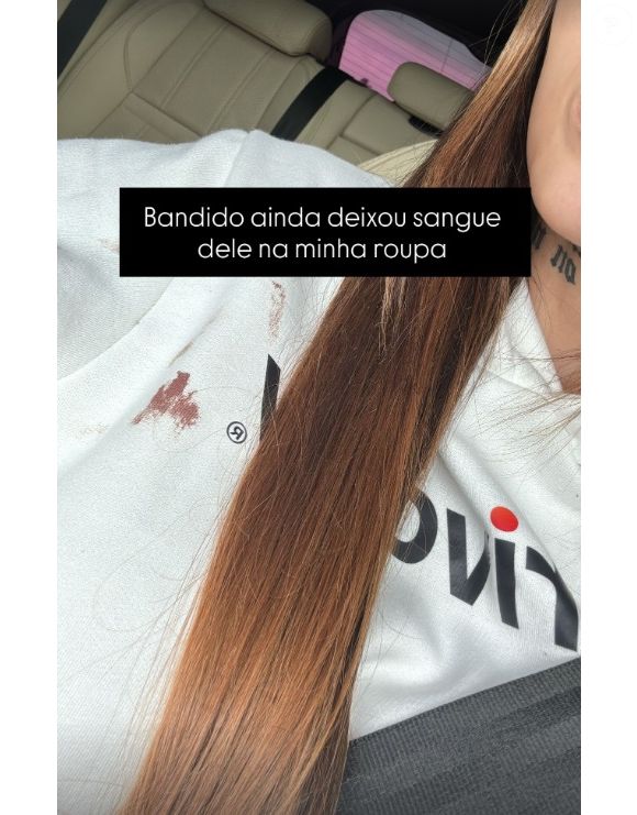 Ex-amante de Neymar, Fernanda Campos mostrou blusa manchada de sangue de um dos criminosos que invadiram sua casa