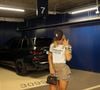 Virginia Fonseca aposta em look "sporty chic" com camisa de Vini Jr., saia cargo, botas over-the-knee e bolsa Hermès Kelly