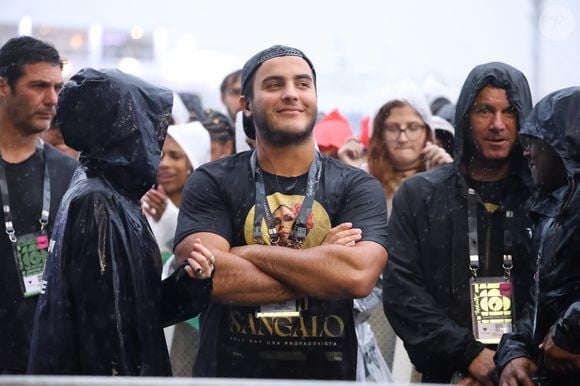 Filho de Ivete Sangalo, Marcelo assistiu na chuva o show da mãe no Rock in Rio