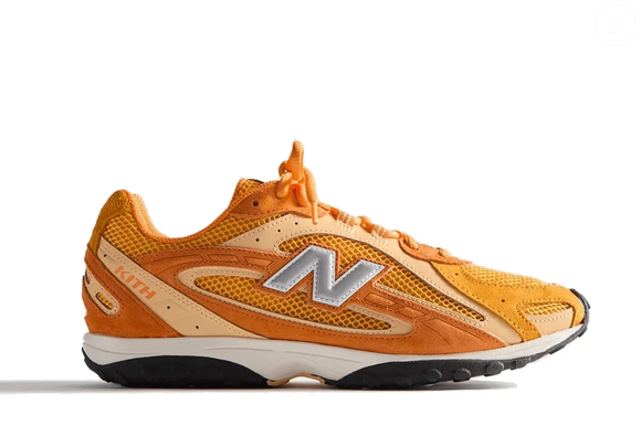 O New Balance 204L Kith Orange se destaca pelo tom vibrante de laranja, cabedal estruturado e entressola confortável, unindo estilo urbano e proposta contemporânea
