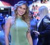 Lívia Andrade e lutador de MMA vão juntos a luta de boxe e web 'shippa' famosos: 'Combinam muito'