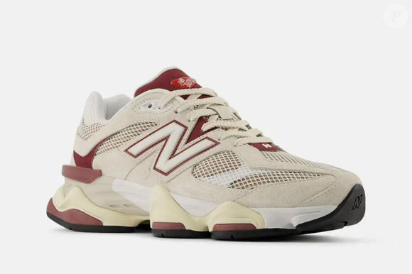 Com cabedal em camurça premium e mesh, o New Balance 9060 'Linen Burgundy' resgata a estética retrô dos anos 2000 e aposta em tons sofisticados de bege e vinho para compor produções elegantes e atemporais