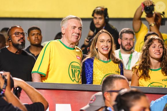 Discreta, Mariann Barrena McClay faz rara aparição pública no Carnaval ao acompanhar Carlo Ancelotti em noite de desfiles no Sambódromo