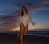 De maiô cavado branco, Paolla Oliveira chama atenção em fotos na praia durante comemoração de aniversário