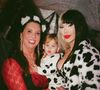 Família reunida: Margareth Serrão prestigia o evento e posa com os netos durante o Halloween de Virginia