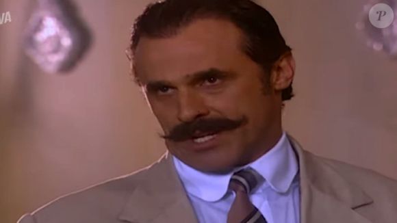 Macário (Oscar Magrini) dá um tiro em Neco, mas, na realidade, é pesadelo de Belinha (Regiane Alves)