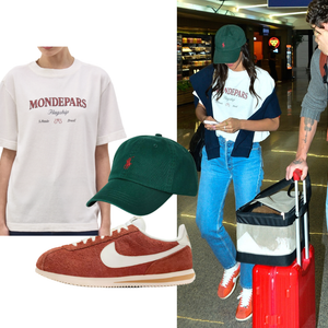 Tênis Nike vermelho, jeans reto e T-shirt da marca de Sasha Meneghel: um raio-x do aerolook de Bruna Marquezine em viagem com Shawn Mendes; teve até 'publi' gratuito para amiga
